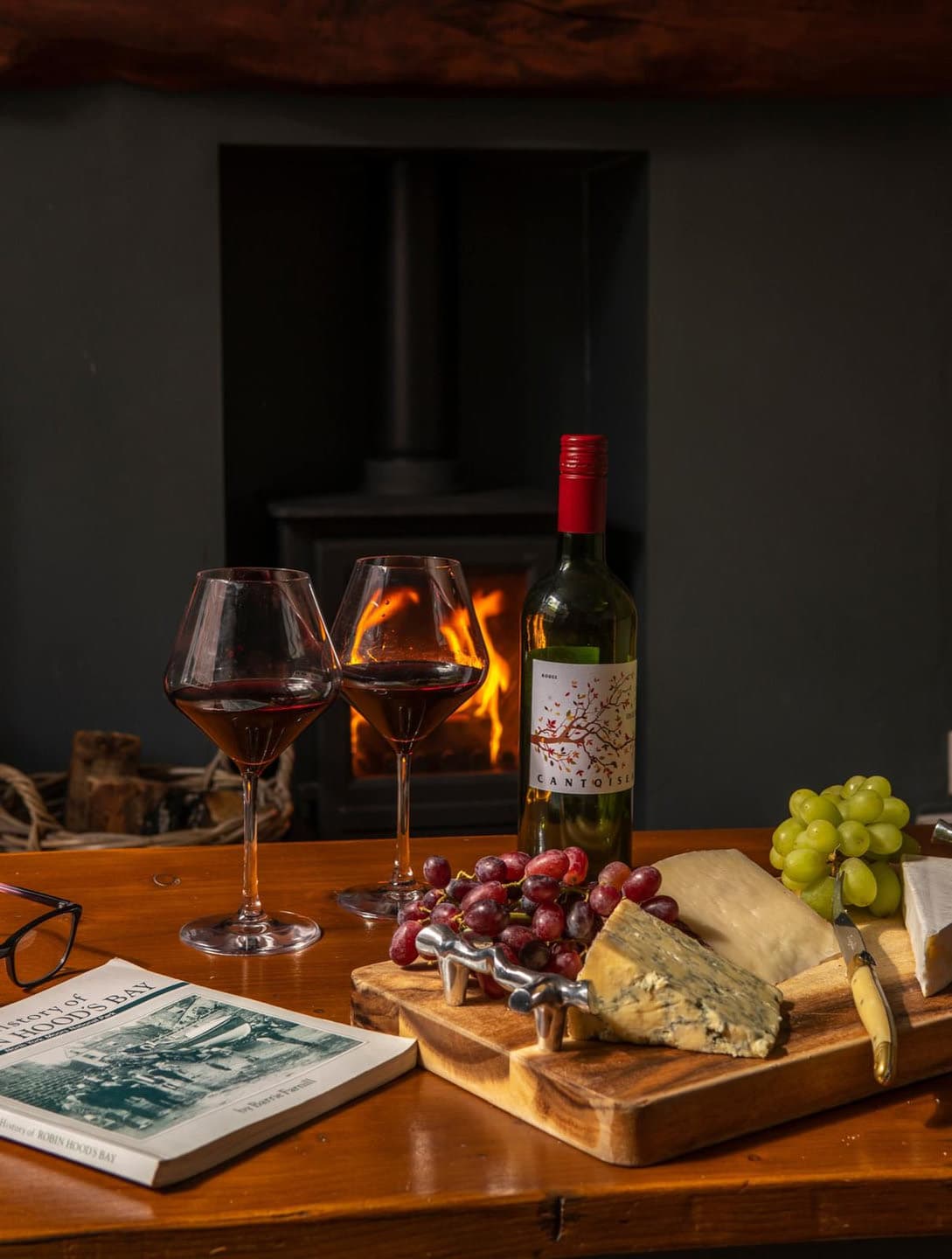Wine and cheese beside the dining kitchen fire