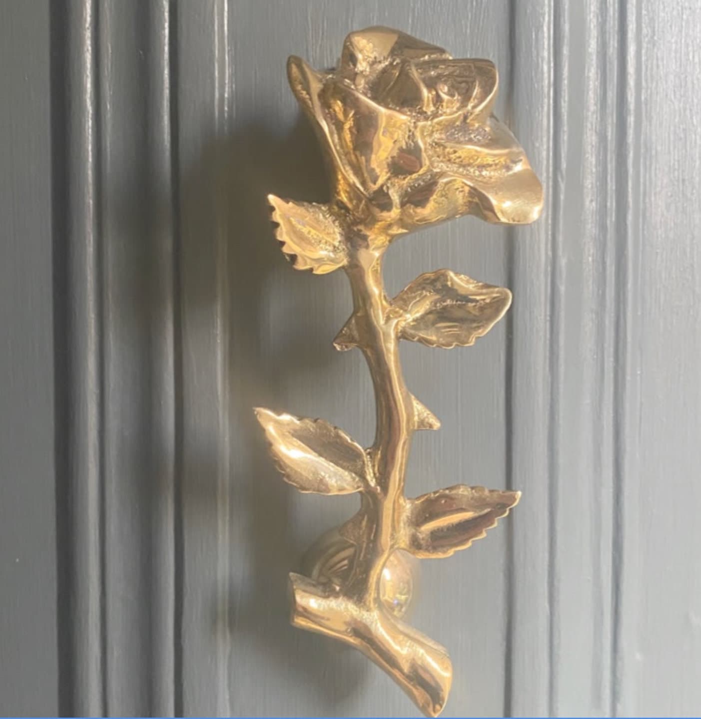A gold rose door ornament