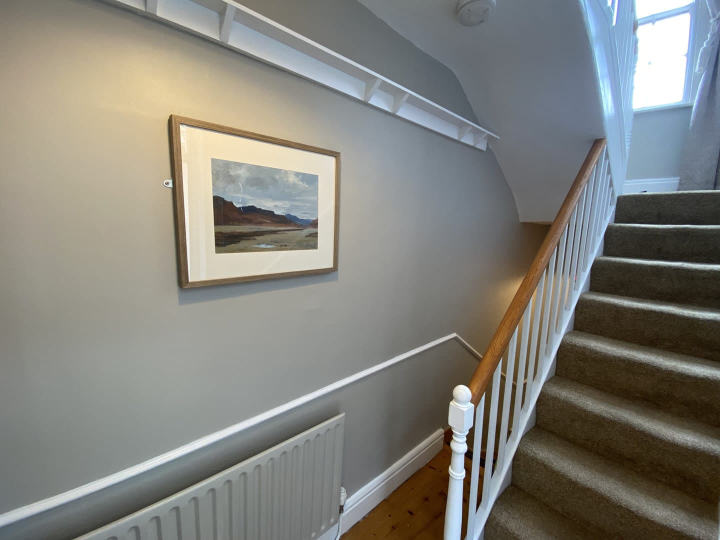 An internal staircase and coastal print