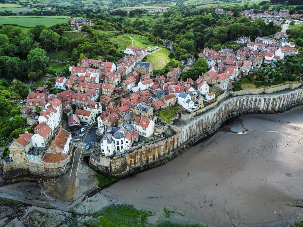 Aerial view of the village and bay at low tide