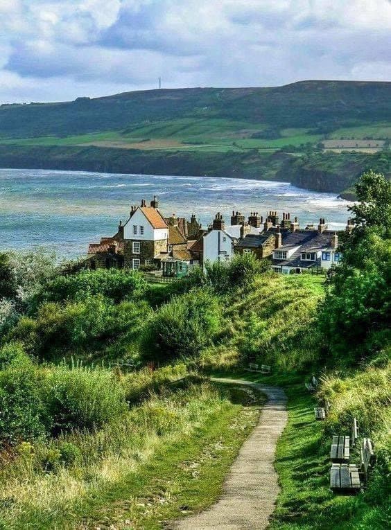 A path overlooking the village and bay